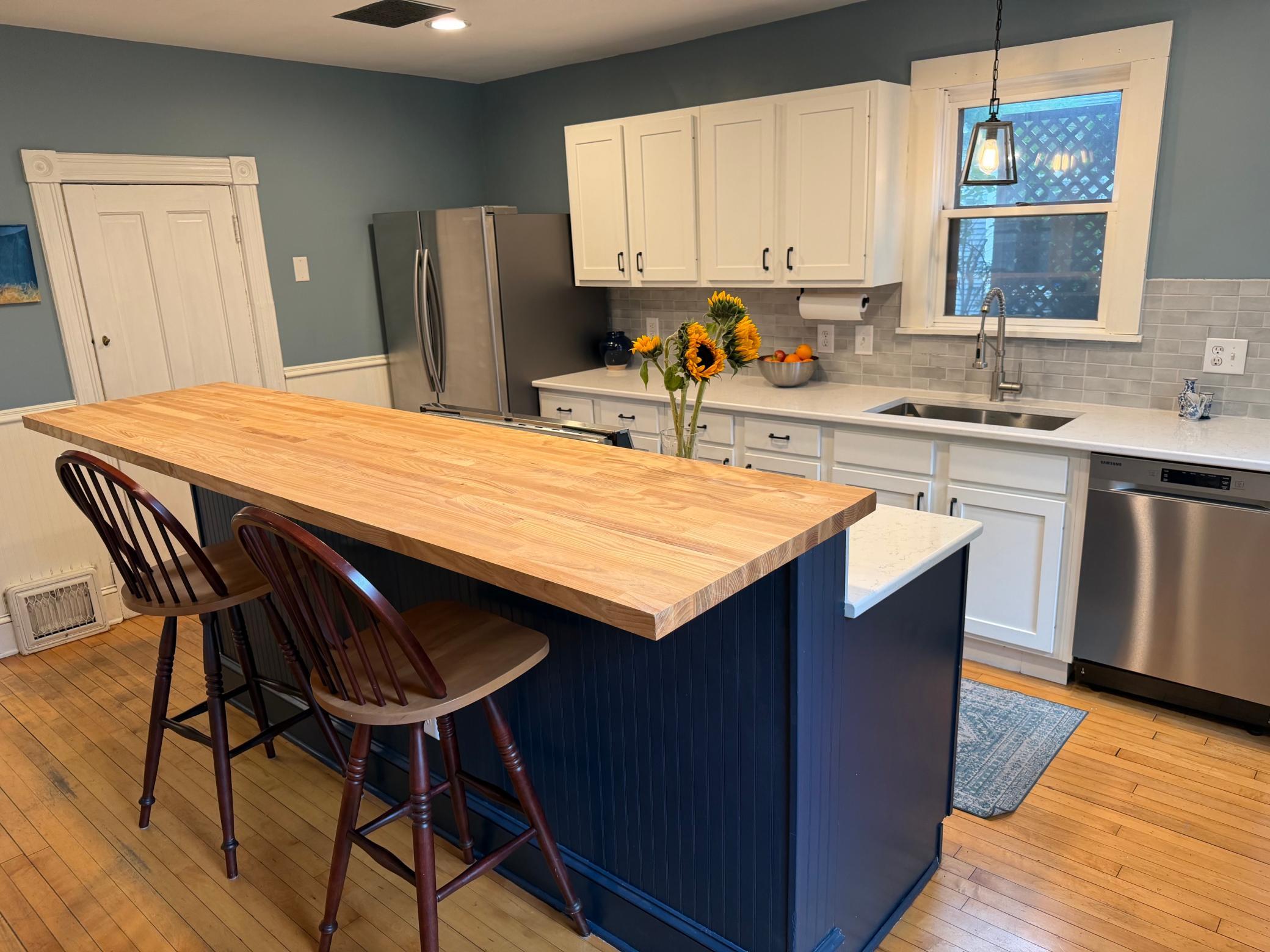 Thoughtfully updated with added cabinetry, modern finishes, and exceptional storage.