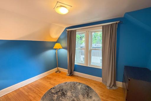 Bright secondary bedroom with walk-in closet.