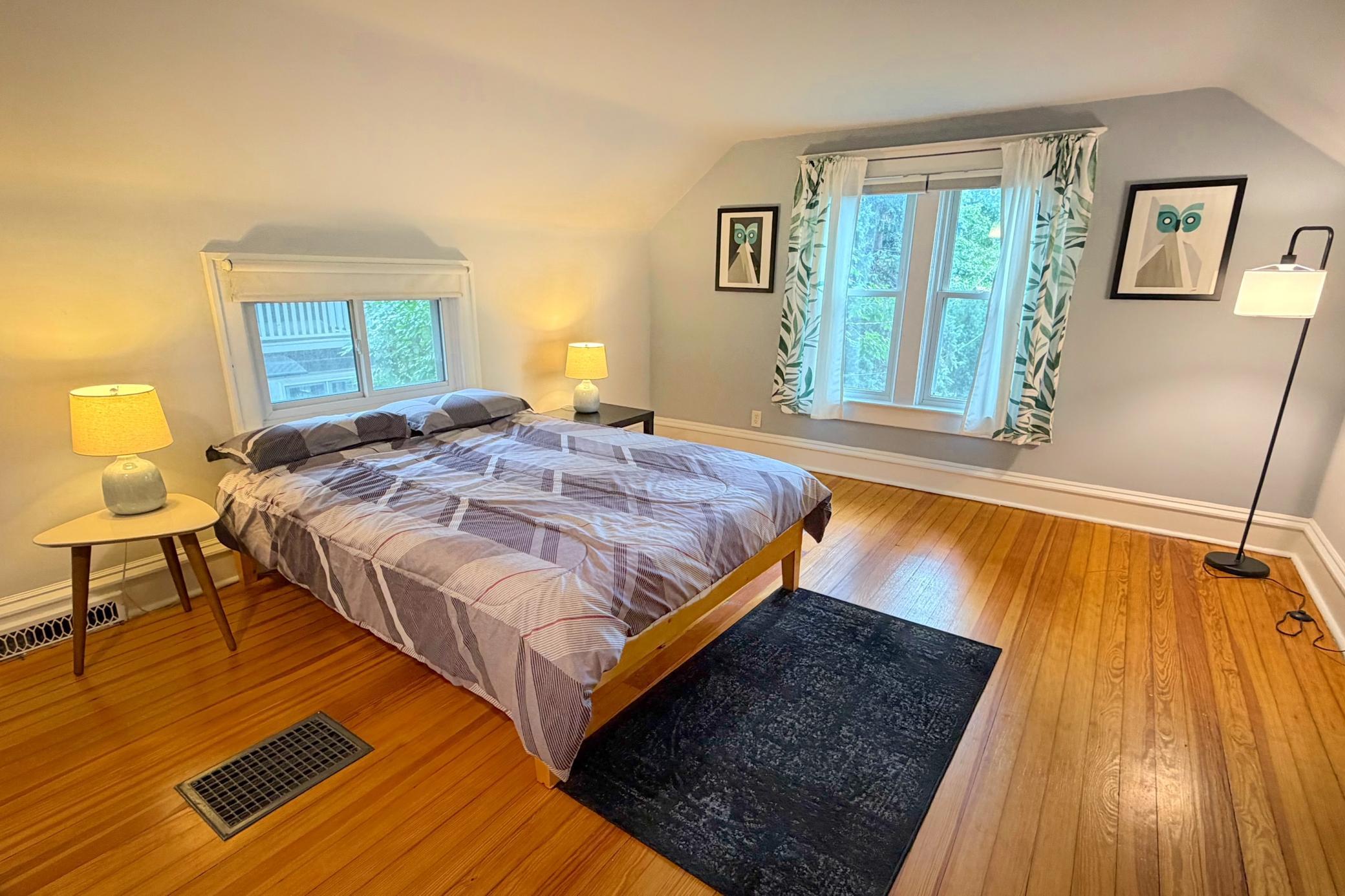 Spacious primary bedroom featuring a walk-in closet.