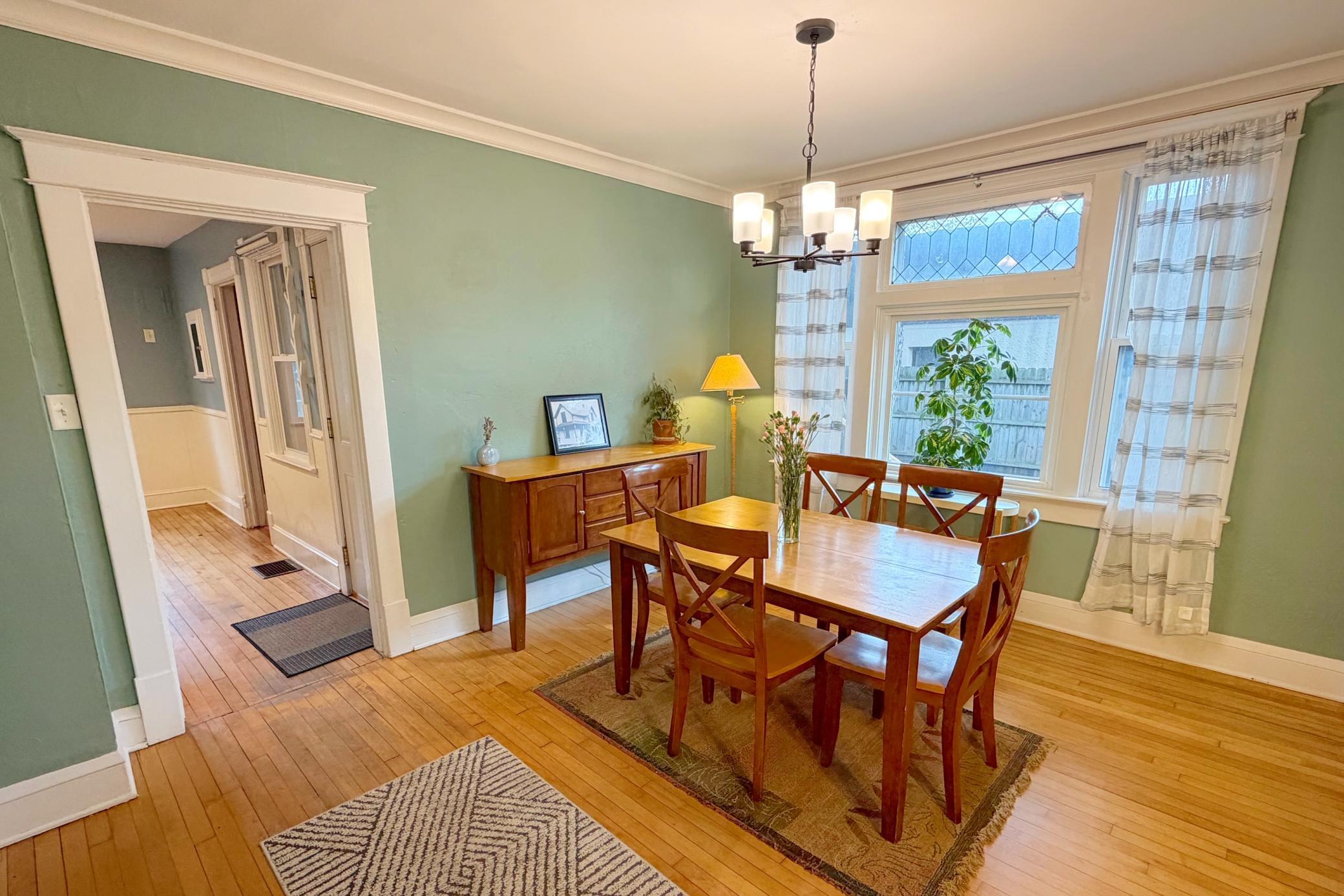 Spacious dining room ideal for hosting holidays and dinner parties.