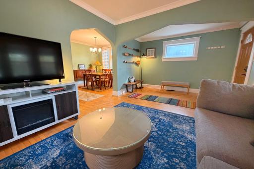 Bright, inviting living room blending historic character with modern comfort.