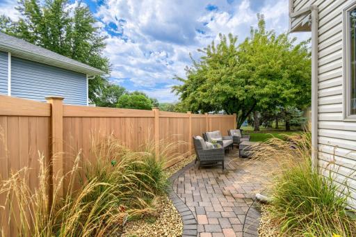Privacy fence off side yard connected to patio