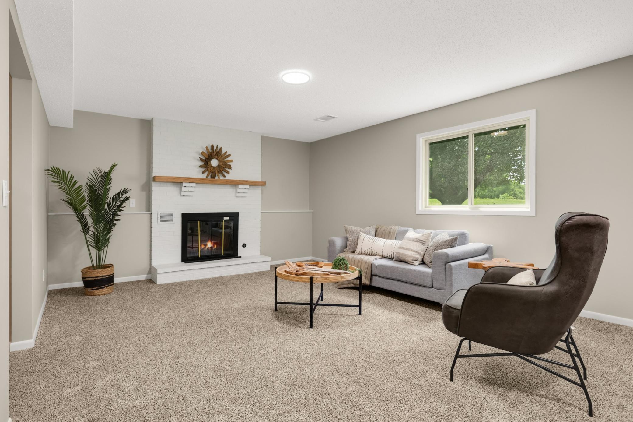 Lower level family room with fireplace