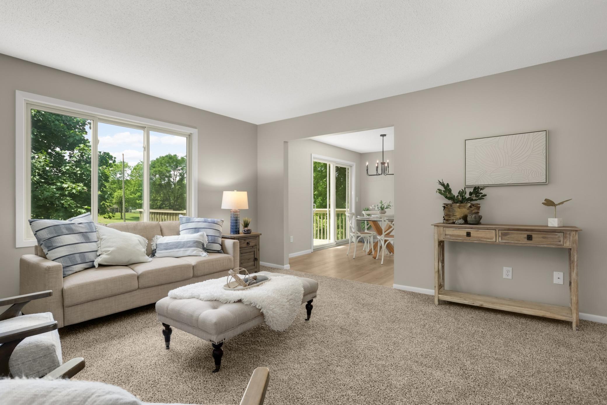 Light filled living room with new flooring.