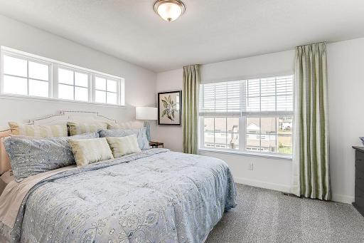 The primary bedroom is a welcome oasis at the end of the day! *Model home, colors and selections will vary.