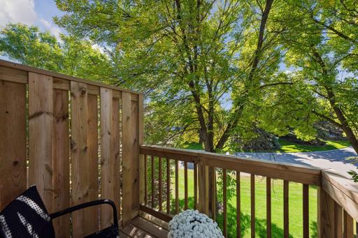 Step outside for a breath of fresh air or a quiet reading breakâthe brand-new deck offers a cozy retreat tucked among mature branches.