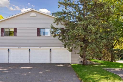 The one-car tuckunder garage belonging to this home is on the far right, marked 7638. Freshly painted inside, with the garage-door opener replaced in 2019.