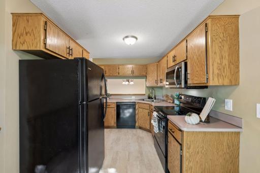 Appliance updates are already in place: a brand-new microwave, plus a refrigerator, stove and dishwasher replaced around 2019. New flooring adds a fresh finishing touch.