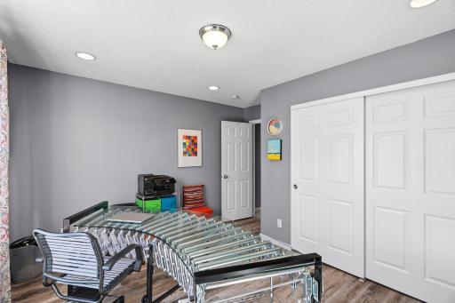 Newer flooring and spacious closet in the 3rd bedroom-currently used as an office.