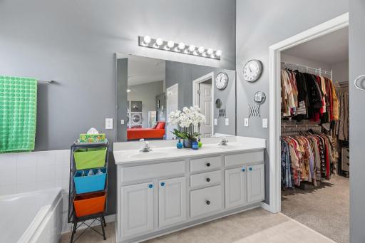 Spacious walk-in closet within the ensuite.