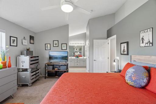 Ensuite primary bedroom is light and bright.