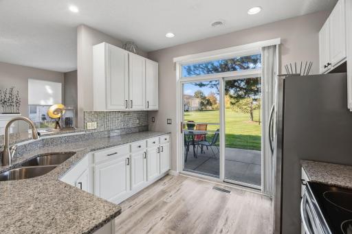 Kitchen is light and bright. Close to the patio.