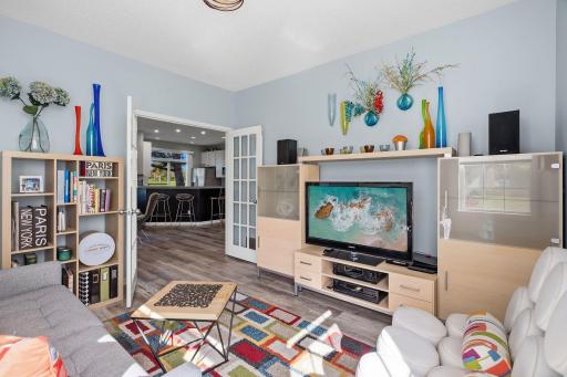 To the right as you enter through the French doorss a den, office, more formal living room? You decide. This flexible space offers many possibilities.