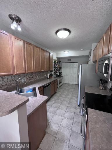 Kitchen with wonderful tile and beautiful back splash