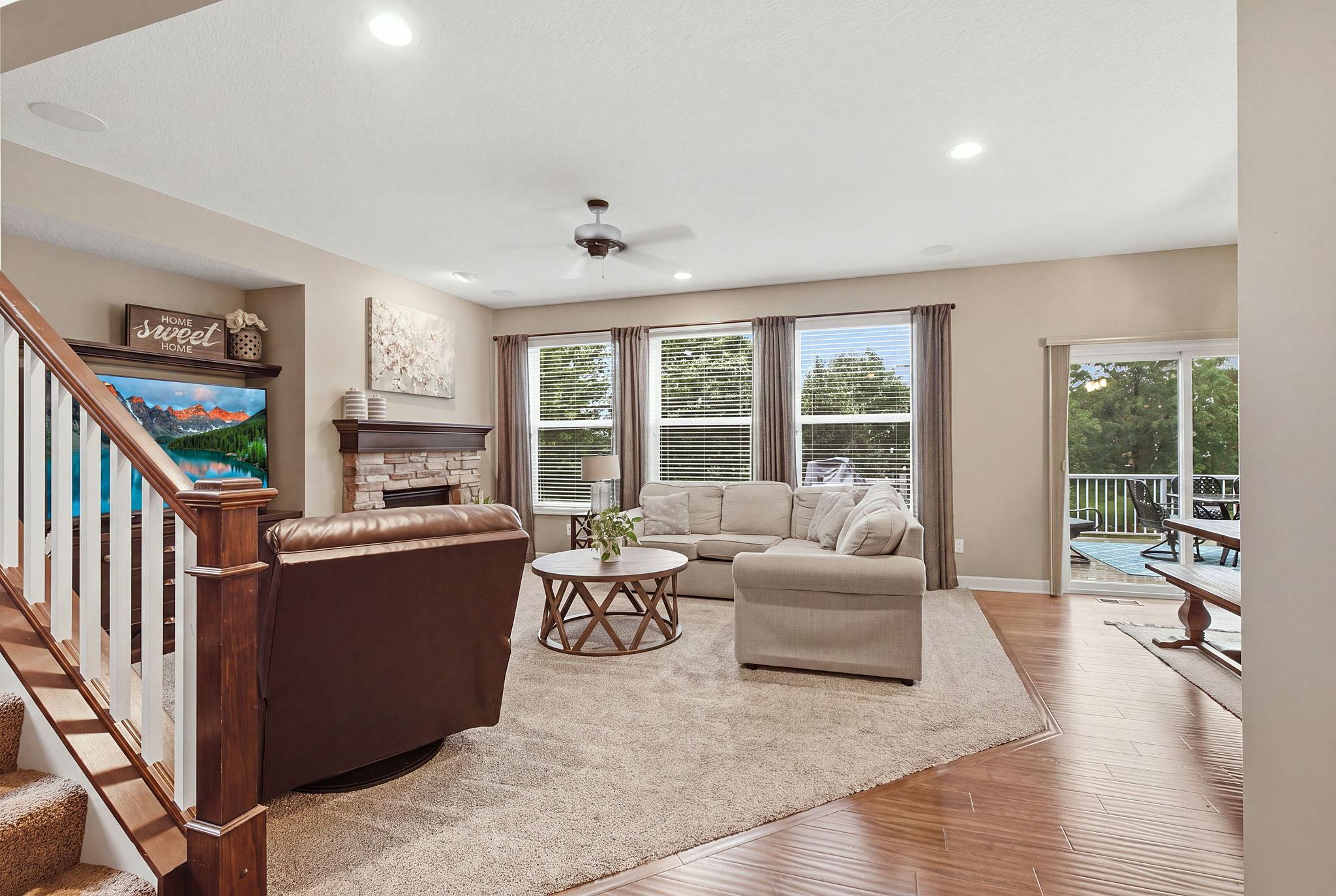 The main floor family room is a perfect spot to relax with bright window over looking the back yard and open flow to main living areas.