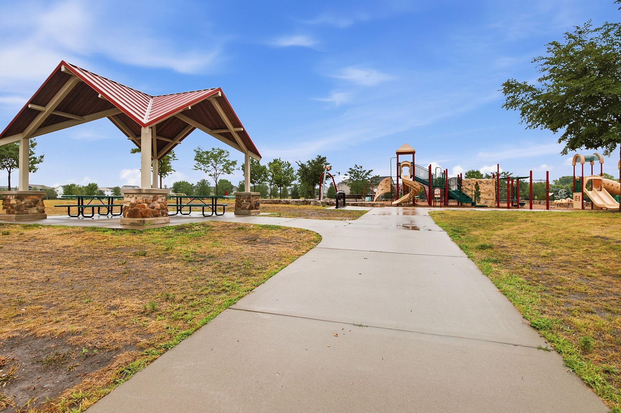 The neighborhood park is a short walk from the home with picnic shelter, playground and walking trails.