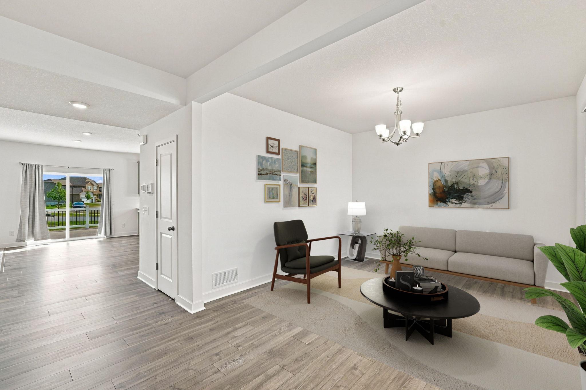 Front porch opens up to a large foyer and formal dining area