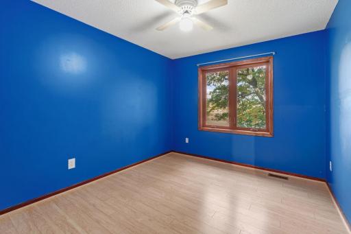 One of Three additional bedrooms provide plenty of space for family, guests, an office, or hobbies.