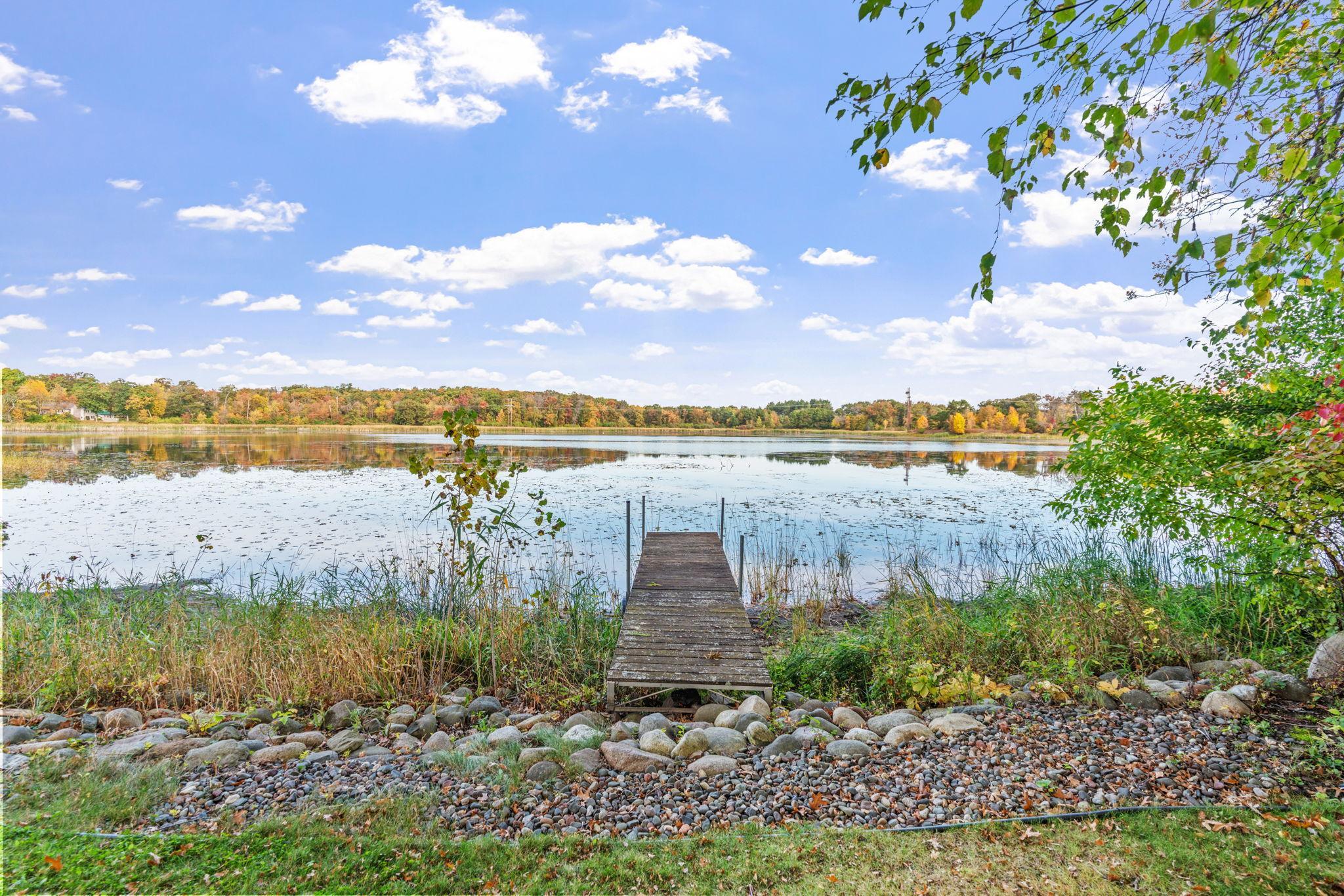 A Rare Gem set on 2 Full Acres with Stunning Million Dollar Views of Kliever Marsh - a small lake or big pond with a dock!