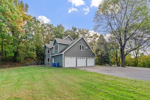 3 Car, Heated Garage with Newly Repaved Horseshoe Driveway!