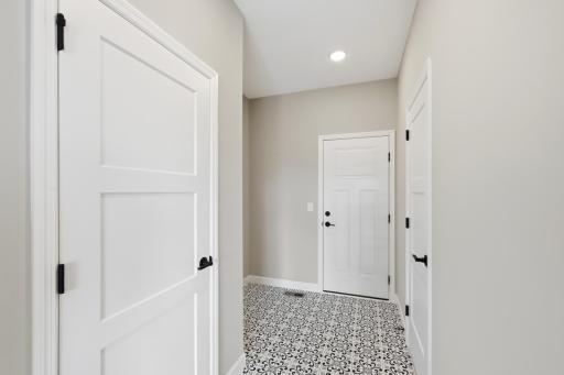 Spacious Mudroom. *photos of a previously completed home, not all options & finishes may be included.*