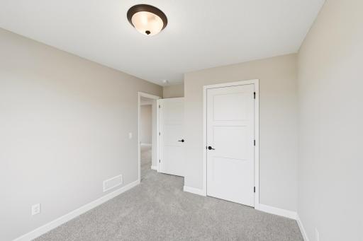 Bedroom 3 *photos of a previously completed home, not all options & finishes may be included.*