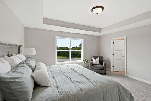 Primary Bedroom. *photos of a previously completed home, not all options & finishes may be included.*