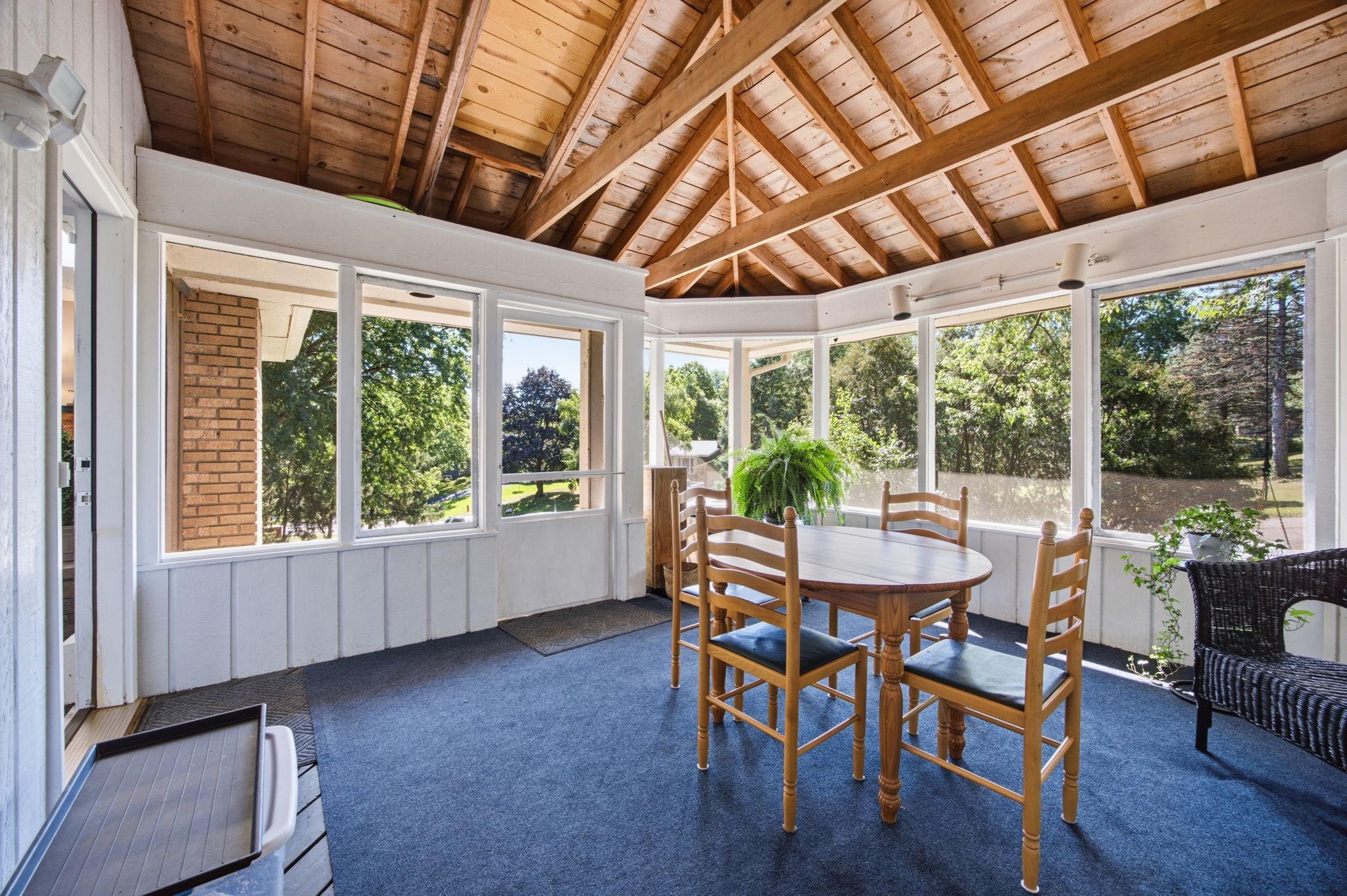 The icing on top of this home is the gorgeous three season porch that provides the perfect space for your morning coffee.