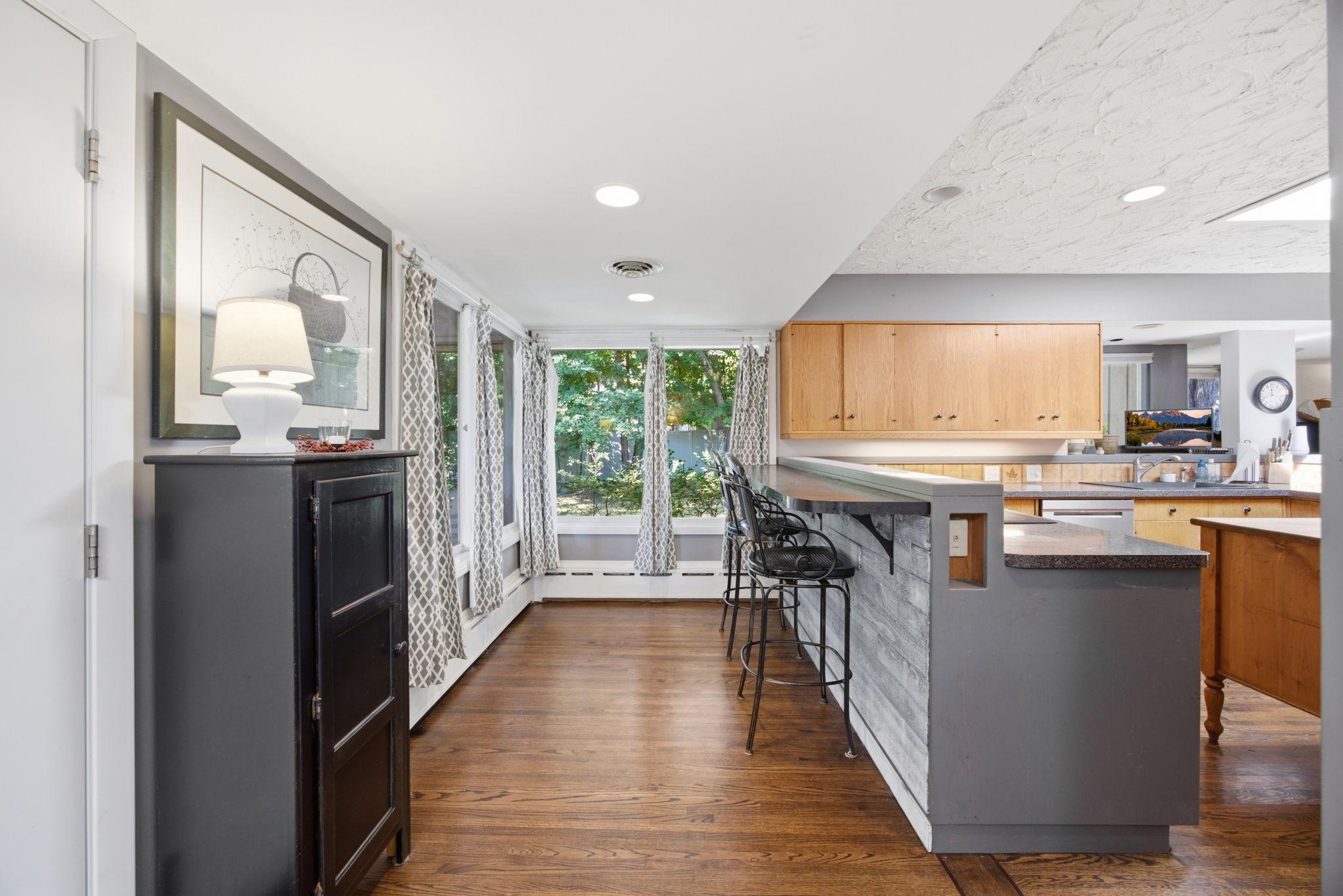 Large windows provide the perfect sun kiss to the main level of this home.
