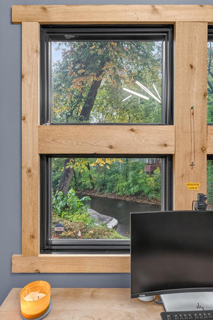 Large studio windows provide direct views of the channel.