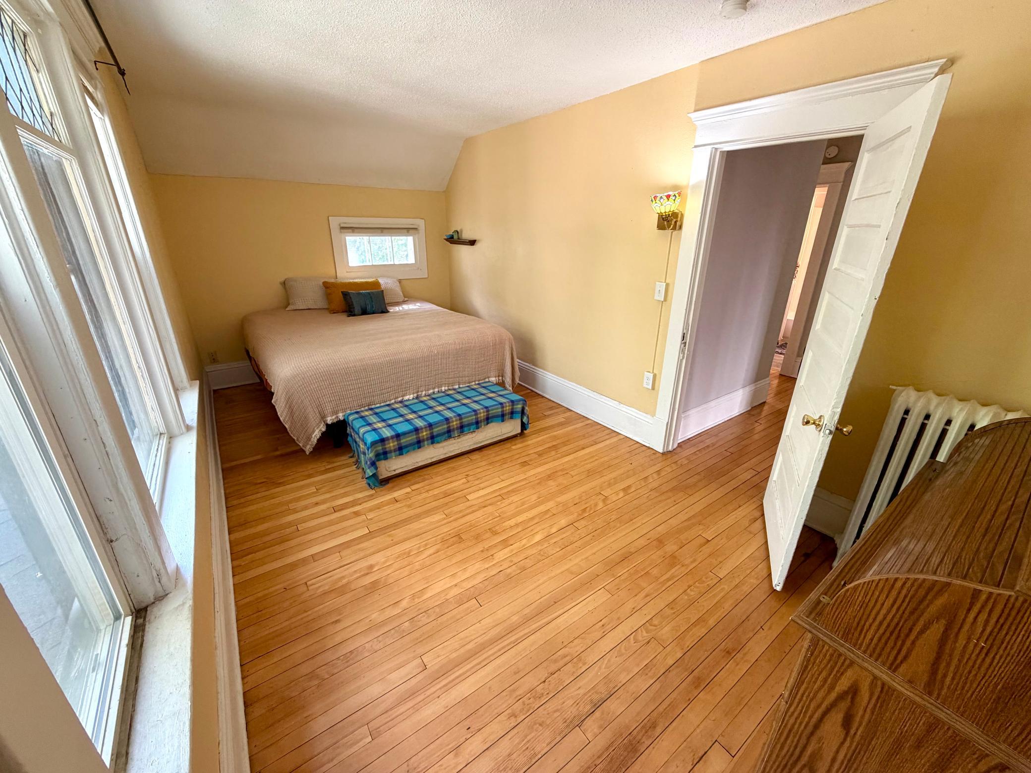 Enjoy the large, light filled east facing primary bedroom!