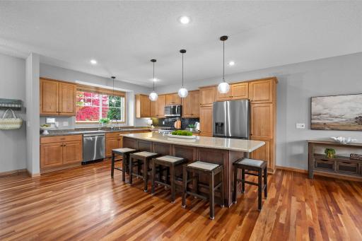 Warm wood cabinetry, a Viking range and a refrigerator, microwave and dishwasher added this spring make this kitchen a standout.