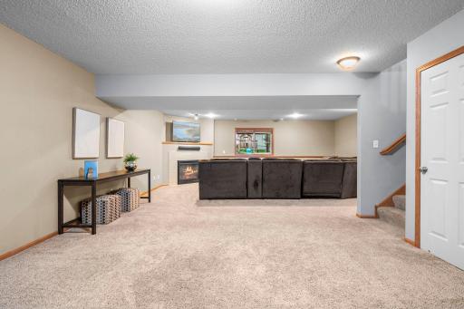 The spacious finished lower level offers plenty of room to relax, entertain and spread out.