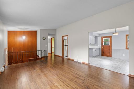 The generous main-level layout provides an easy flow between the living room, dining area, and kitchen