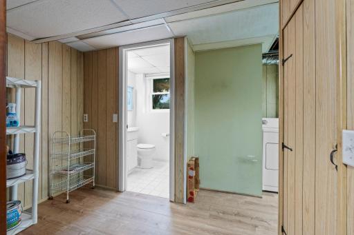 The lower level includes a convenient laundry area with easy access to an additional bathroom