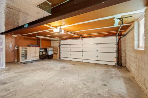 Plenty of extra room in the garage for vehicles and storage, with direct access into the home