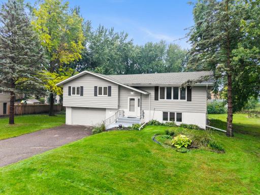 Tucked into a charming, quiet neighborhood, this well-cared-for home offers a spacious floor plan, generous yard, and convenient Golden Valley location