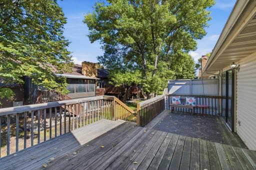 Wood deck overlooking yard and green space