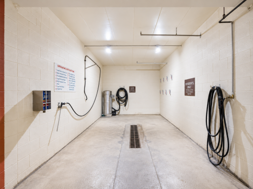 Beyond the unit itself, the building delivers an extraordinary amenity package designed for comfort, convenience, and lifestyle enjoyment. Residents benefit from hall storage, an assigned parking stall, and a complimentary car wash bay.