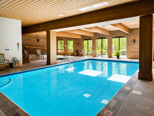 Beautiful indoor view out to the expansive windows overlooking the backyard and nature views.