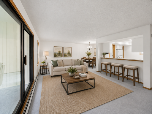 Open Living Room area open to walls of walk out windows to patio. Eat In Kitchenette area for quick meals and dining area around the corner.