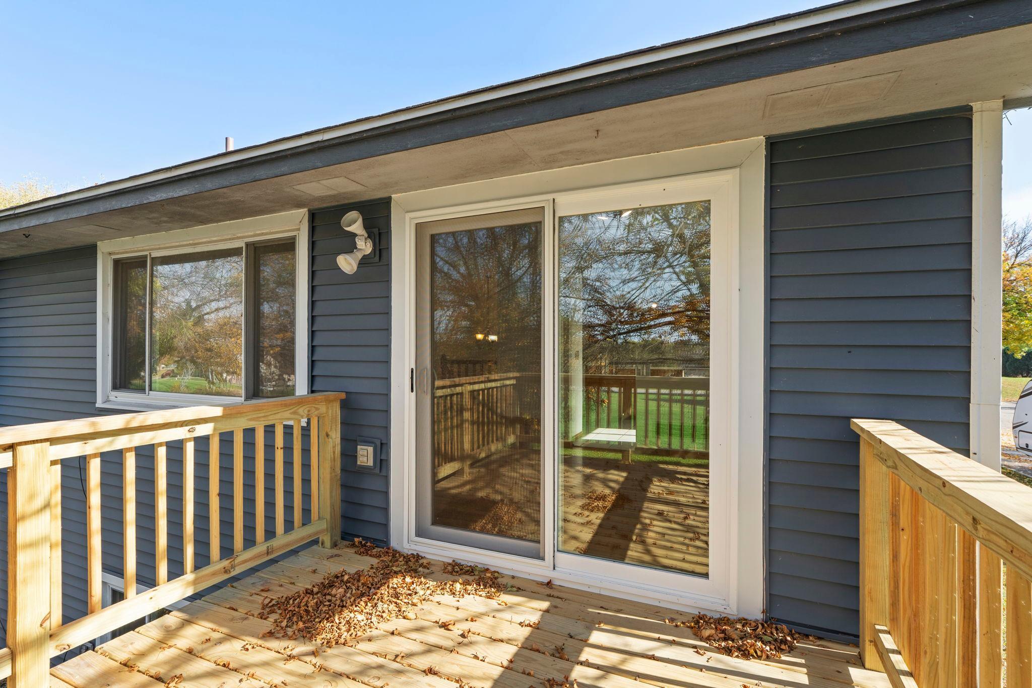 Step outside from the dining area onto the newer deck and enjoy the privacy of the backyard, creating an ideal space for morning coffee, summer gatherings, or simply relaxing outdoors.