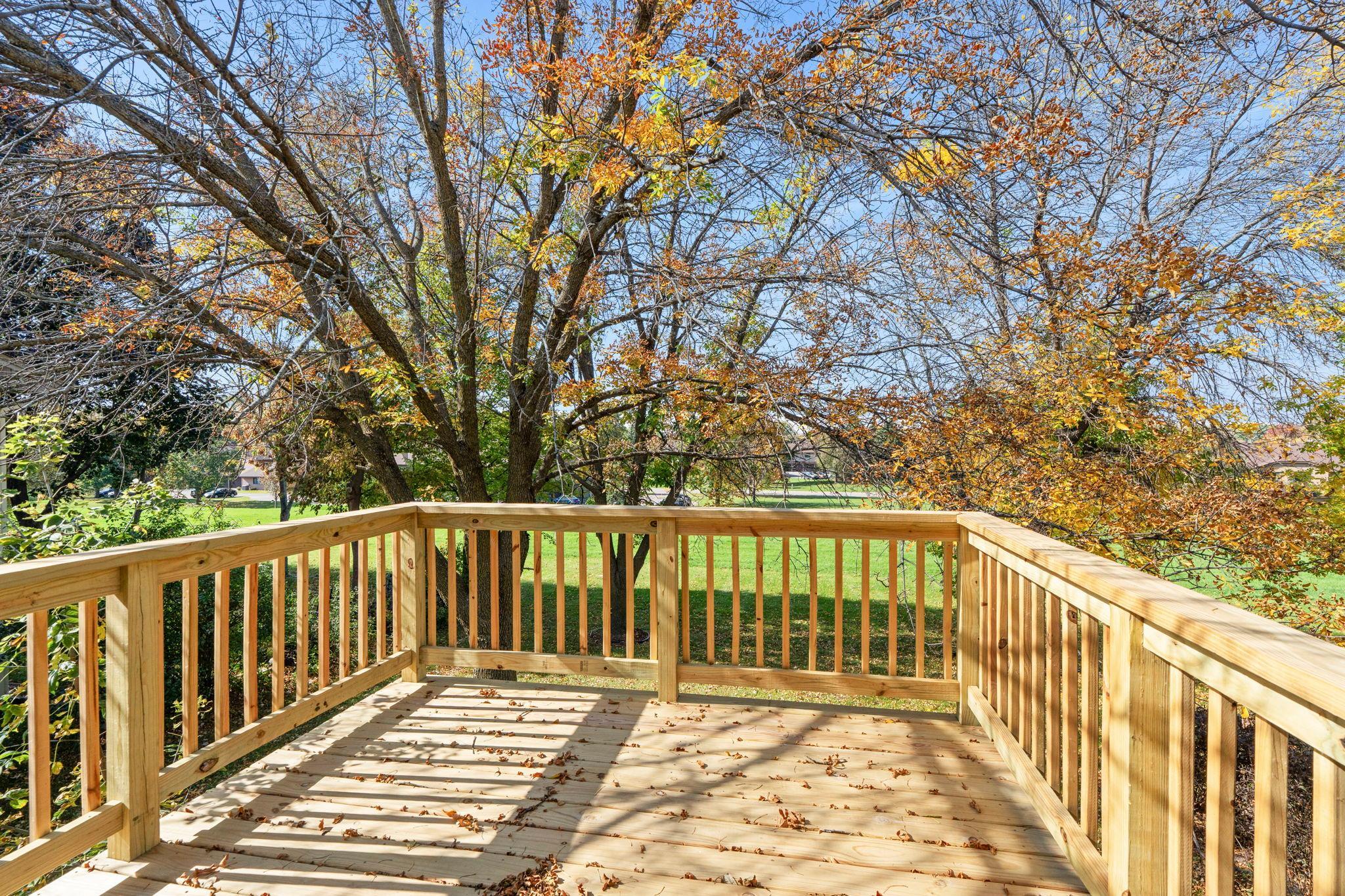 Check out this new deck overlooking the private backyard!