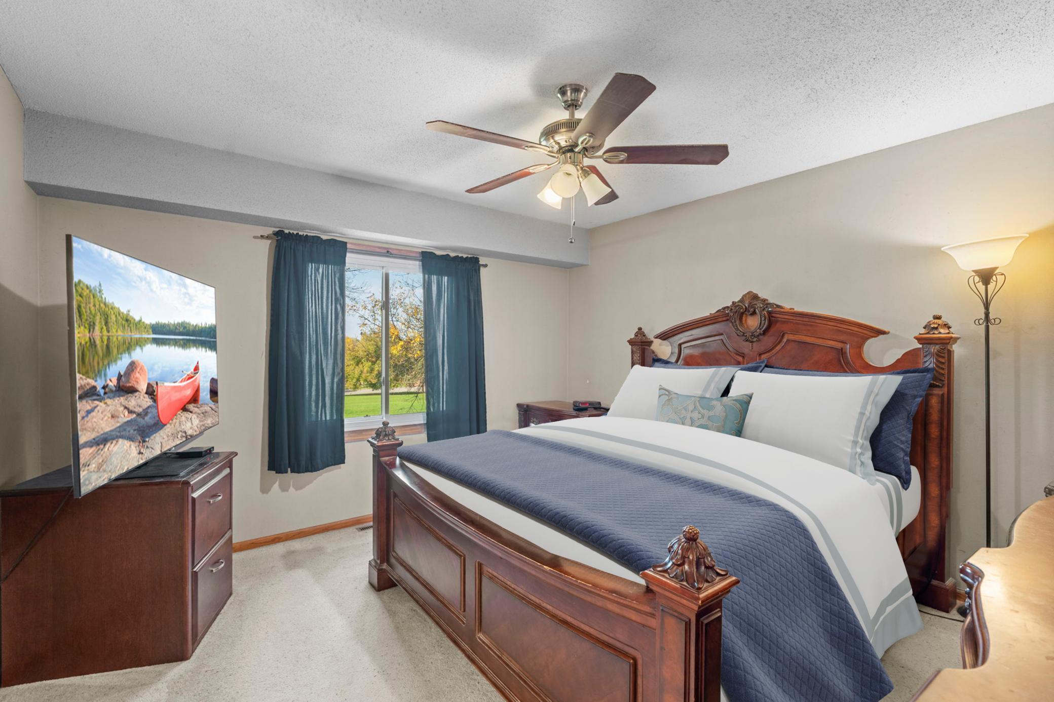 Large primary bedroom connected to the bathroom.