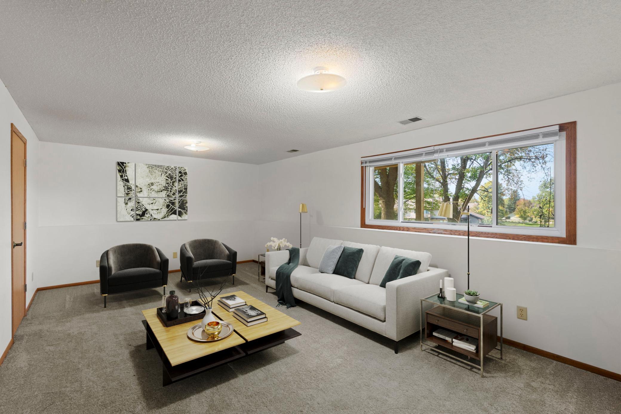 Large lower level with two additional bedrooms and a bathroom. Perfect for entertaining, the in-laws or multi-generational living.