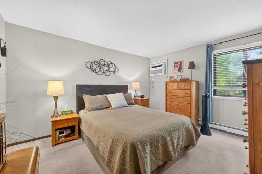 Large primary bedroom with private 3/4 bathroom and his/her closets.