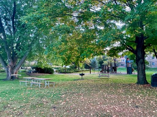 Enjoy the park complete with picnic area with grill, playground, tennis & pickleball courts +++