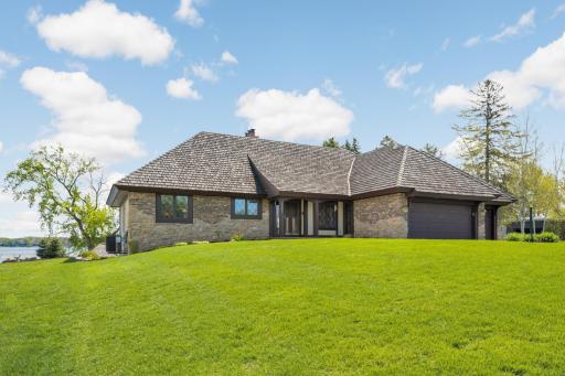 Custom-built home with English Tudor-inspired architecture