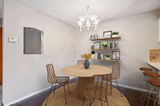 The dining room has been virtually staged.