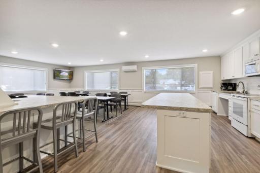 The renovated party room is perfect for hosting your next social gathering.